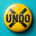 Yellow undo button icon on a blue background, modern and bold. Royalty Free Stock Photo