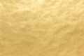 Yellow uneven surface of lined craft paper