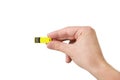 Yellow USB flash memory on hand with isolated white background Royalty Free Stock Photo