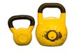 Yellow used and old kettlebells isolated on white background. Workout equipment