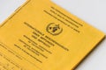 Yellow vaccination card from the World Health Organization
