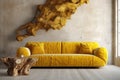 Yellow velvet sofa near stucco wall with wooden abstract sculpture. Rustic interior design of modern living room. Created with