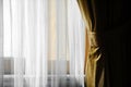 Yellow velvet window curtain Royalty Free Stock Photo