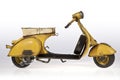 Yellow Vespa scooter lateral Royalty Free Stock Photo