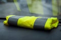 yellow vest on dashboard in car symbol of yellow vest Royalty Free Stock Photo