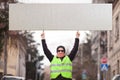 yellow vest political activist protesting on street