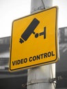 Yellow video control sign in the street.