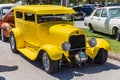 Yellow vintage Ford hot rod at a car show Royalty Free Stock Photo
