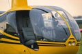 Yellow vintage helicopter on stage. Close up Royalty Free Stock Photo