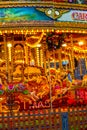 Yellow Vintage merry-go-round wooden horses in carusel Royalty Free Stock Photo