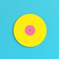 Yellow vinyl record on bright blue background in pastel colors. Minimalism concept