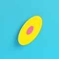 Yellow vinyl record on bright blue background in pastel colors. Minimalism concept