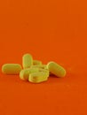 Yellow vitamin B scattered close up Royalty Free Stock Photo