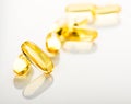 Yellow vitamin e fish oil capsule