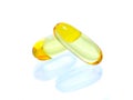 Yellow vitamin omega3 fish oil capsule on white background Royalty Free Stock Photo