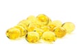 Multiple yellow fish oil, omega 3, vitamin D capsules, healthy diet, heart health concept, large detailed isolated macro closeup