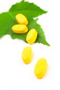 Yellow vitamin pills