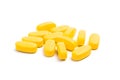 Yellow vitamin pills