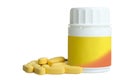 Yellow vitamins and bottle Royalty Free Stock Photo