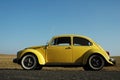 Yellow Volkswagen beetle Royalty Free Stock Photo