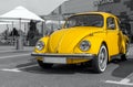 Yellow Volkswagen Beetle car - selective color isolation