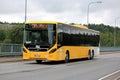 Yellow Volvo 8900 Bus in Urban Environment