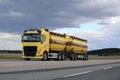 Yellow Volvo FH Tank Truck in Bulk Transport along Highway Royalty Free Stock Photo
