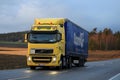 Yellow Volvo FH Transport in Evening