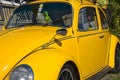 Yellow VW Beetle 1500 Classic car Royalty Free Stock Photo