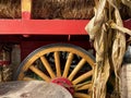 Yellow Wagon Wheel On A Vintage Cart With Fall/autumn Harvest Season Vibes.