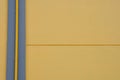 Yellow wall and drain pipe background Royalty Free Stock Photo