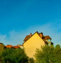 Yellow wall of the house against the blue sky Royalty Free Stock Photo