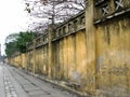 The yellow wall of a silk weaving factory Royalty Free Stock Photo