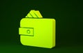 Yellow Wallet with stacks paper money cash icon isolated on green background. Purse icon. Cash savings symbol