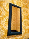 Yellow wallpapers and mirror