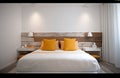 Yellow and warm modern bedroom with neutral wooden interior. AI Generative. Royalty Free Stock Photo