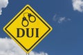 Yellow warning DUI with handcuffs road sign Royalty Free Stock Photo