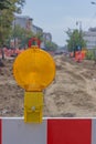 Yellow warning ligh on construction barrier sign Royalty Free Stock Photo