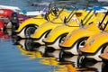 Yellow water bikes in the form of cars