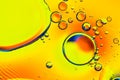 Yellow water bubbles abstract background. Oil drops in water abstract psychedelic pattern image Royalty Free Stock Photo