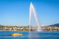 A yellow water bus is crossing the bay of Geneva Royalty Free Stock Photo