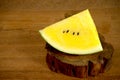 Yellow water mellon on wood teak Royalty Free Stock Photo