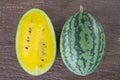 Yellow watermelon on table Royalty Free Stock Photo