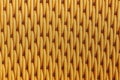 Yellow weaved plastic texture Royalty Free Stock Photo