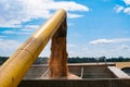 Yellow wheat harvester in the field. Big combine harvesting the wheat. Royalty Free Stock Photo