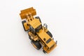 Yellow wheel loader model on  a white background,Top view Royalty Free Stock Photo