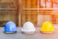 Yellow, white and blue hard safety helmet hat for safety project Royalty Free Stock Photo