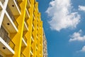 Yellow and white building and blue sky