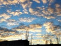 bright yellow and white clouds on blue sky