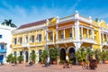 Yellow and White Colonial Building